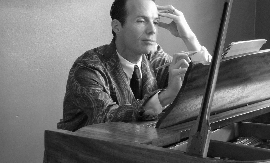 Actor composing at the piano